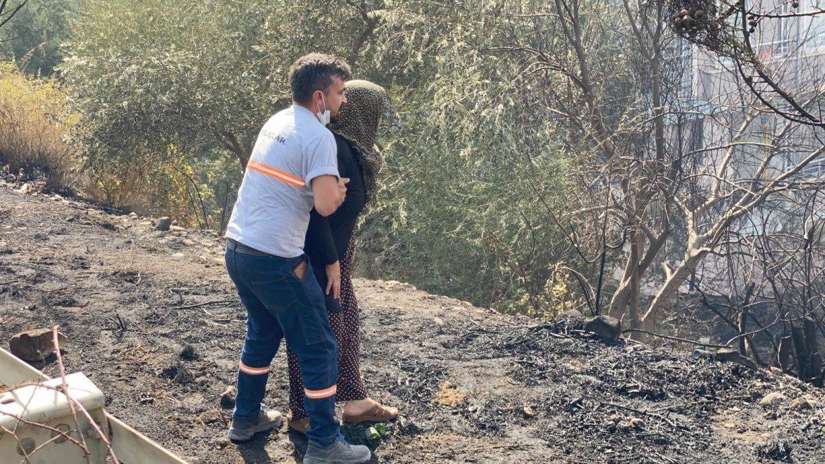 Hatay'da alevlerin evine yaklaştığını gören kadın