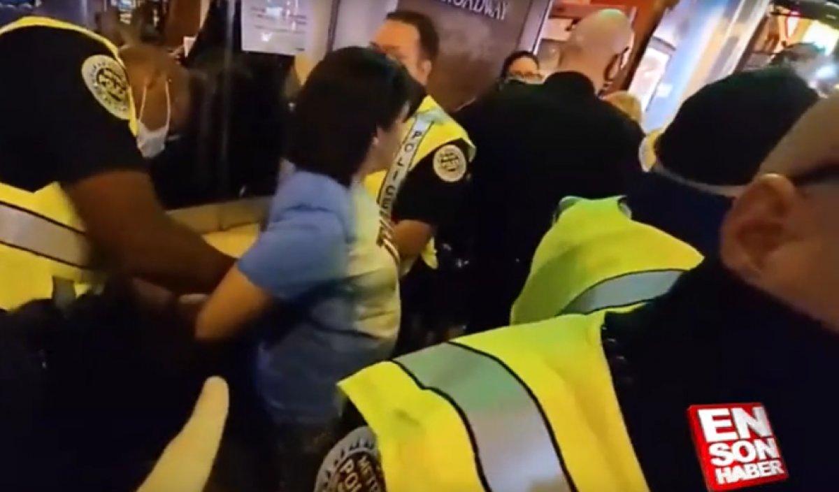 ABD'de maskesiz kadına kelepçeli gözaltı