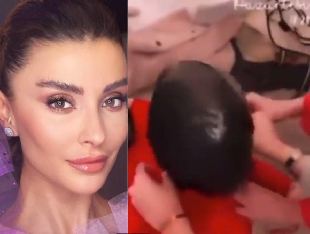 Özge Ulusoy'un kafasına çöp poşeti geçirdiler