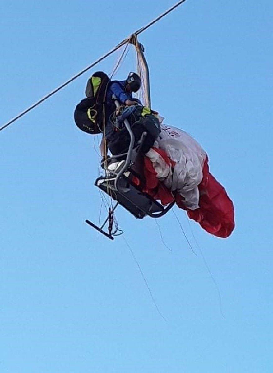 Muğla'da paraşüt, telesiyet hattına dolandı