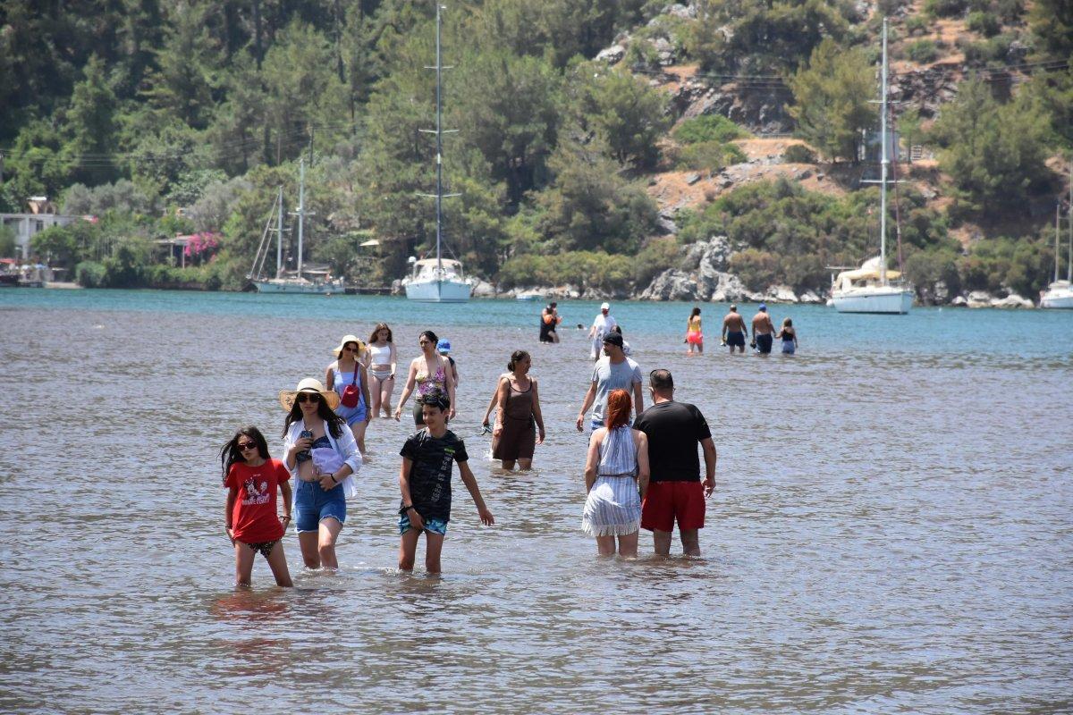 Kızkumu'na yerli ve yabancı turistlerin ilgisi yoğun