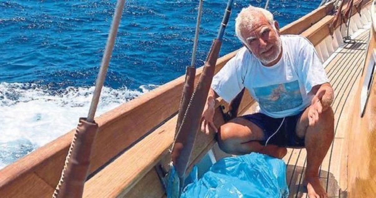 Muğla'da denize atılan çöp poşetleri, denizciyi isyan ettirdi