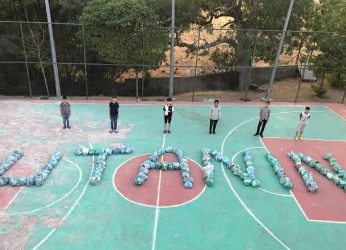 Bingöl’de çocuklar çöpleri toplayıp, 'utanın' yazdılar