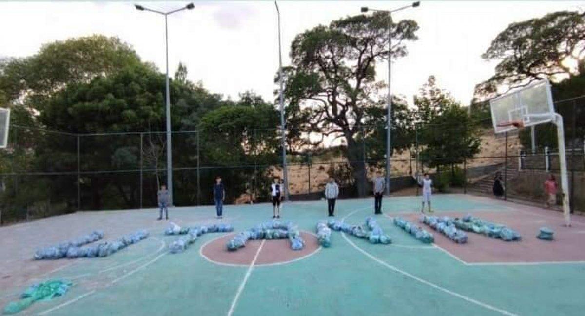 Bingöl’de çocuklar çöpleri toplayıp, 'utanın' yazdılar