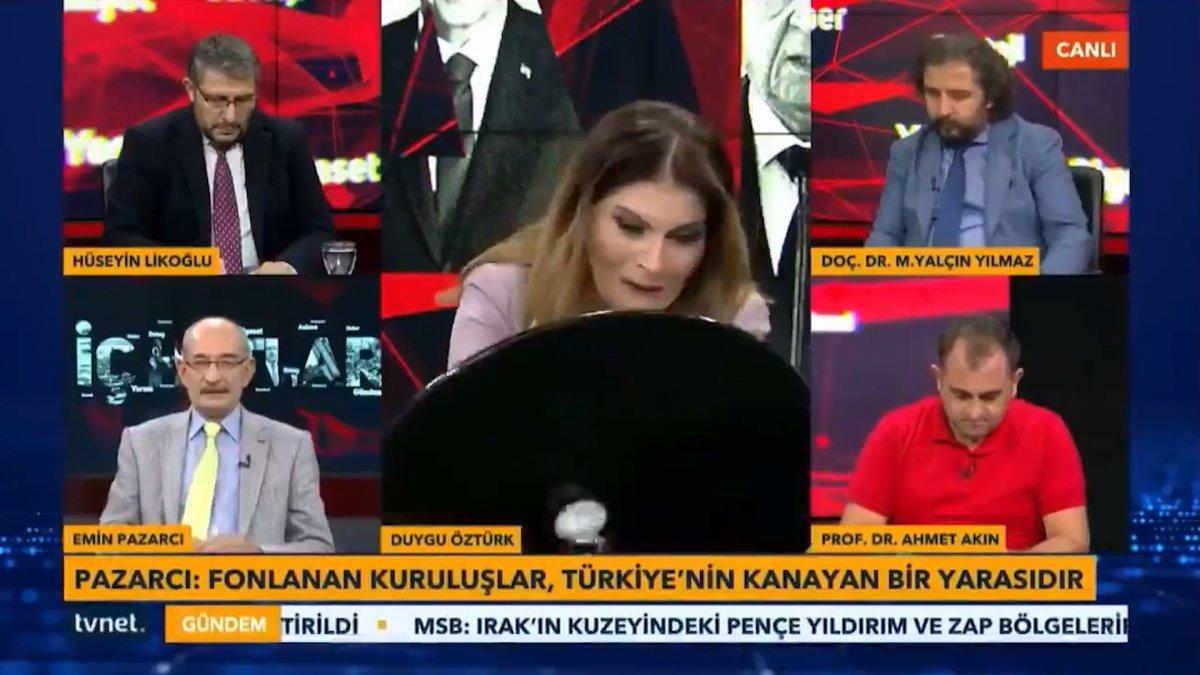 Canlı yayında masa kırıldı