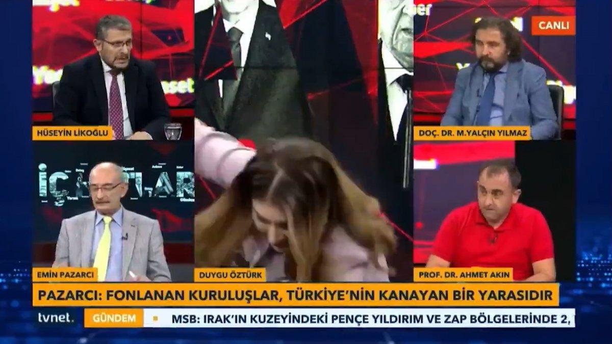 Canlı yayında masa kırıldı