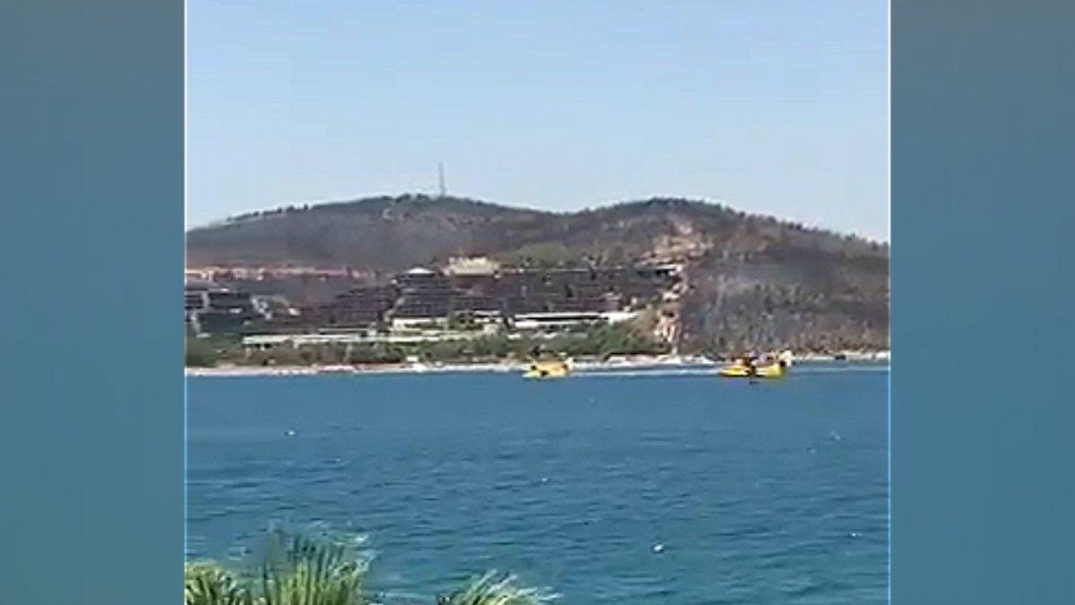 Bodrum'da jet-skilerin eğlencesi, söndürme uçağına engel oldu