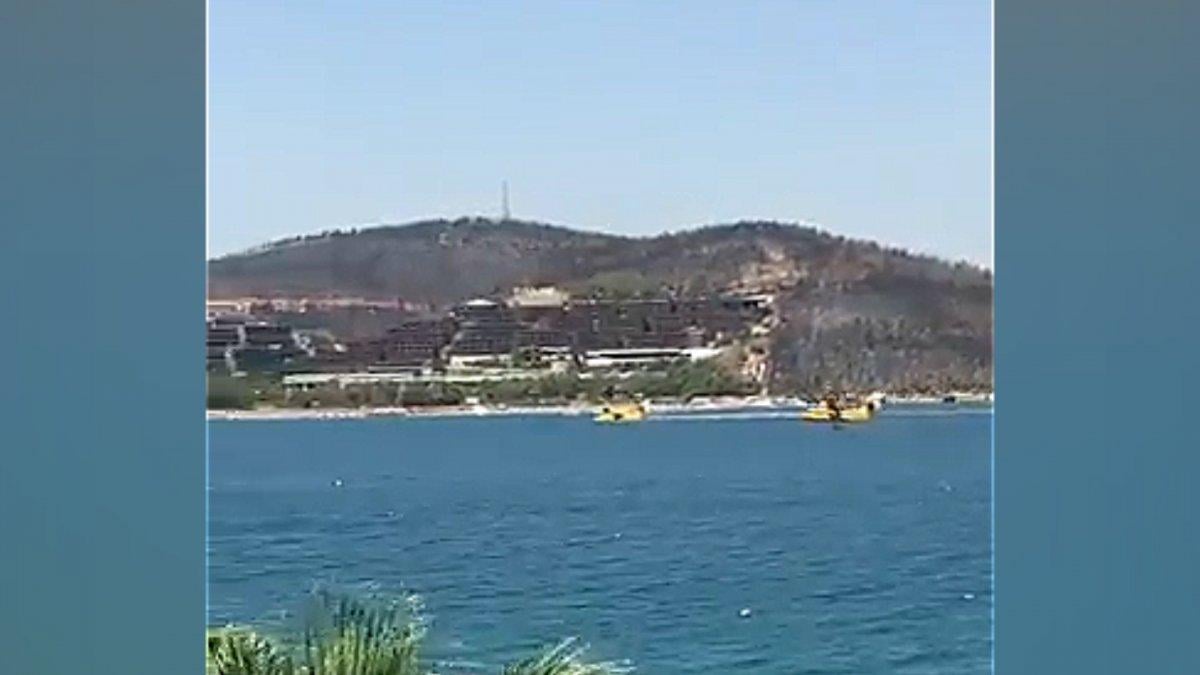 Bodrum'da jet-skilerin eğlencesi, söndürme uçağına engel oldu