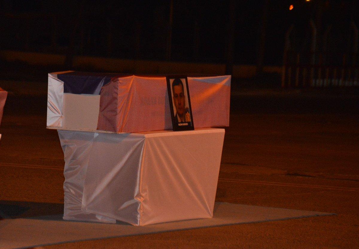 Rus mürettebatın cenazeleri, törenle ülkelerine gönderildi