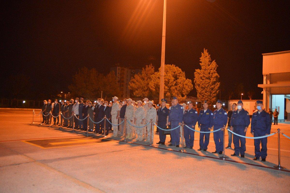 Rus mürettebatın cenazeleri, törenle ülkelerine gönderildi