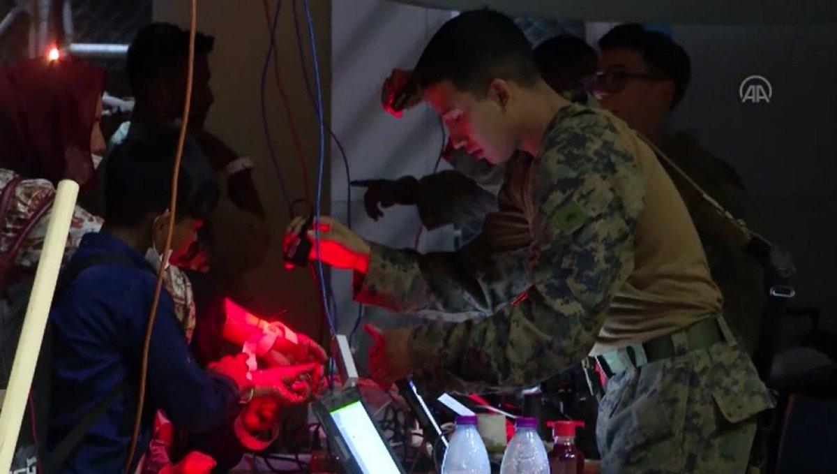 Kabil'den tahliyelerde ABD barkod sistemi kullanıyor