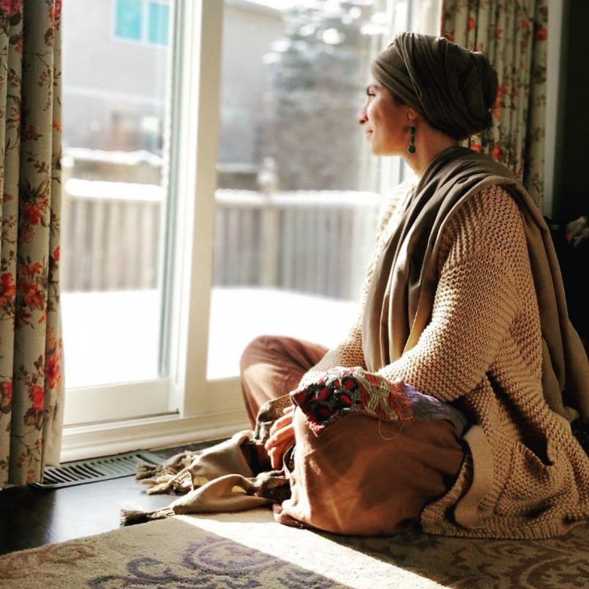 Afgan kadın, ülkesinden ayrılmak istemiyor