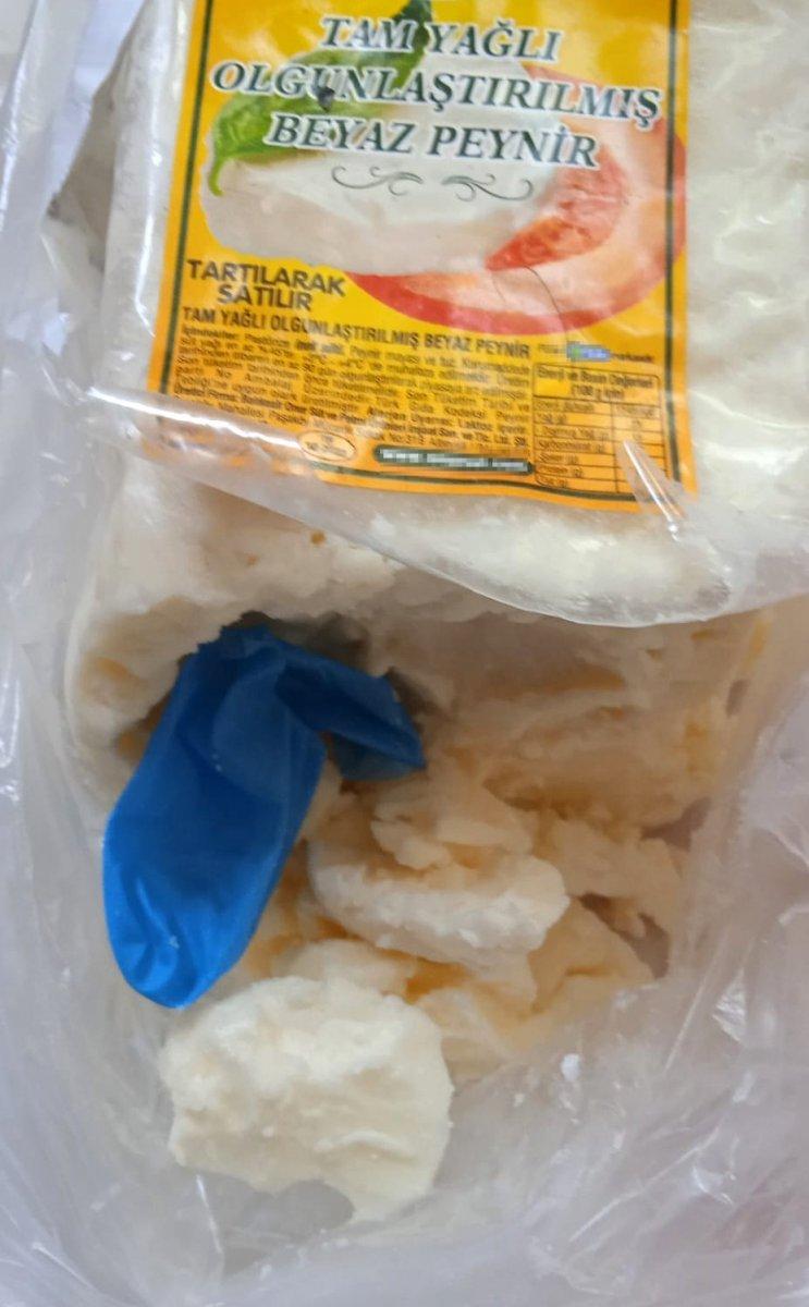 Muğla’da, marketten alınan peynirin içinden eldiven çıktı