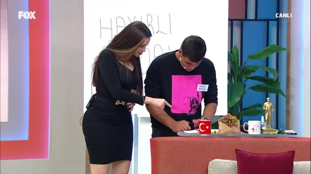 Canlı yayında karısının olduğunu iddia ettiği cinsel içerikli videoyu izletti