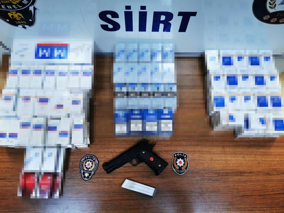 Siirt'te sahte polisler, market ve raflardan kaçak sigara aldı