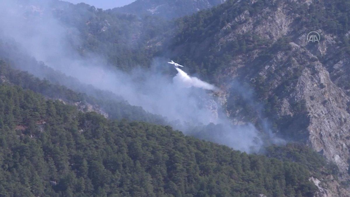 Antalya’da turistler, ‘yangın manzaralı’ fotoğraflar çektirdi