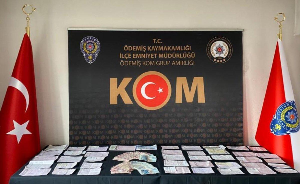 İzmir'de tefecilik operasyonu: 2 gözaltı