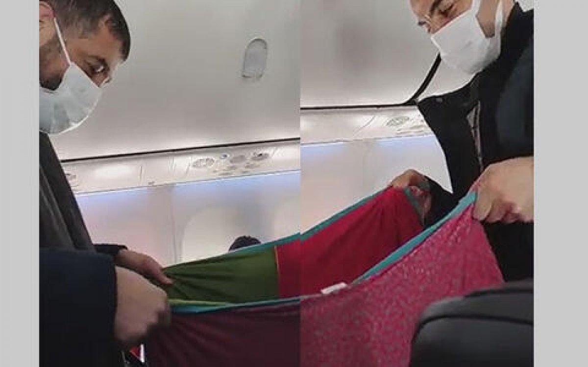 Bingöl uçağında ağlayan bebeği yolcular sallayarak uyuttu