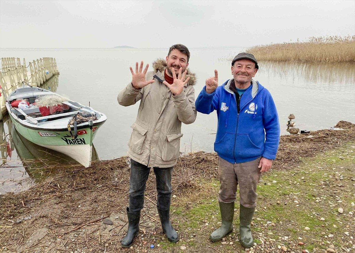 Yaren leylek ile balıkçı Adem Yılmaz'ın 11'inci buluşması