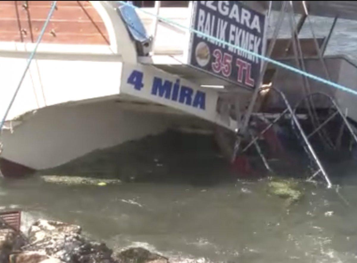 İzmir'de şiddetli rüzgar, tekneyi devirdi