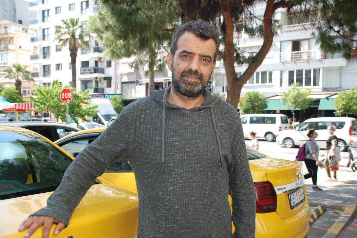 İzmir'de bir taksici, sokak ortasında kadına şiddete müdahale etti