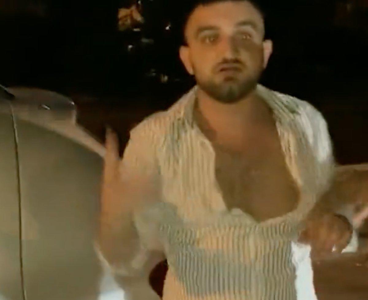 Aracın içinde eşini darbeden şahsı vatandaş yere serdi