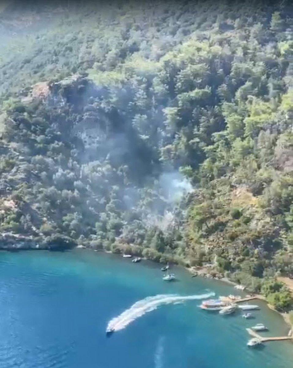 Muğla'da Bedri Rahmi Koyu'nda çıkan orman yangını büyümeden söndürüldü