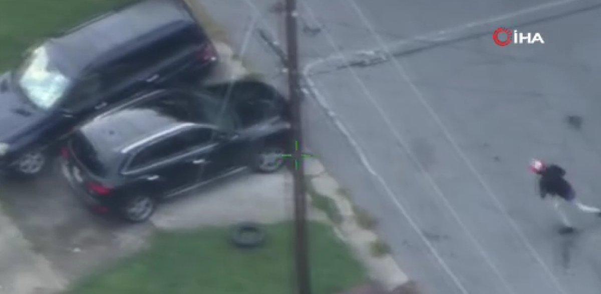 ABD polisi, kaçan şüpheliyi yakalamak için göle atladı