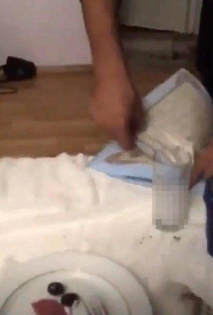 İzmir'de rakı masasında Kur’an-ı Kerim’i yakanlar yakalandı