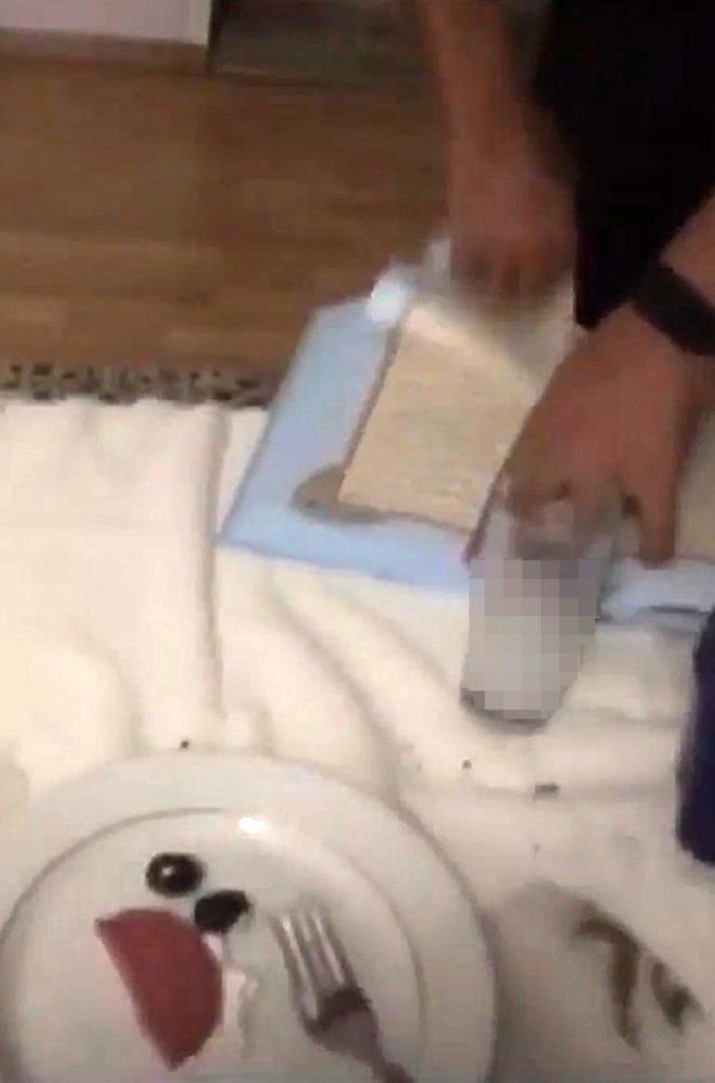 İzmir'de içki masasında Kur’an-ı Kerim’i yakan şahıslara tutuklama