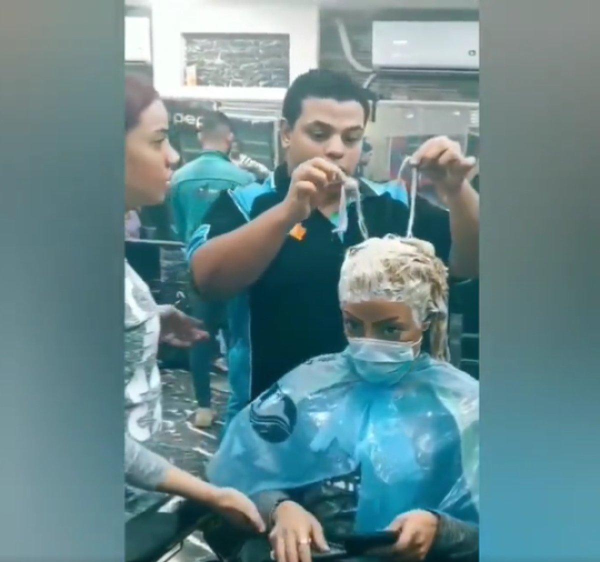 Açıcıyı fazla kaçıran kuaför kadının saçlarını yaktı